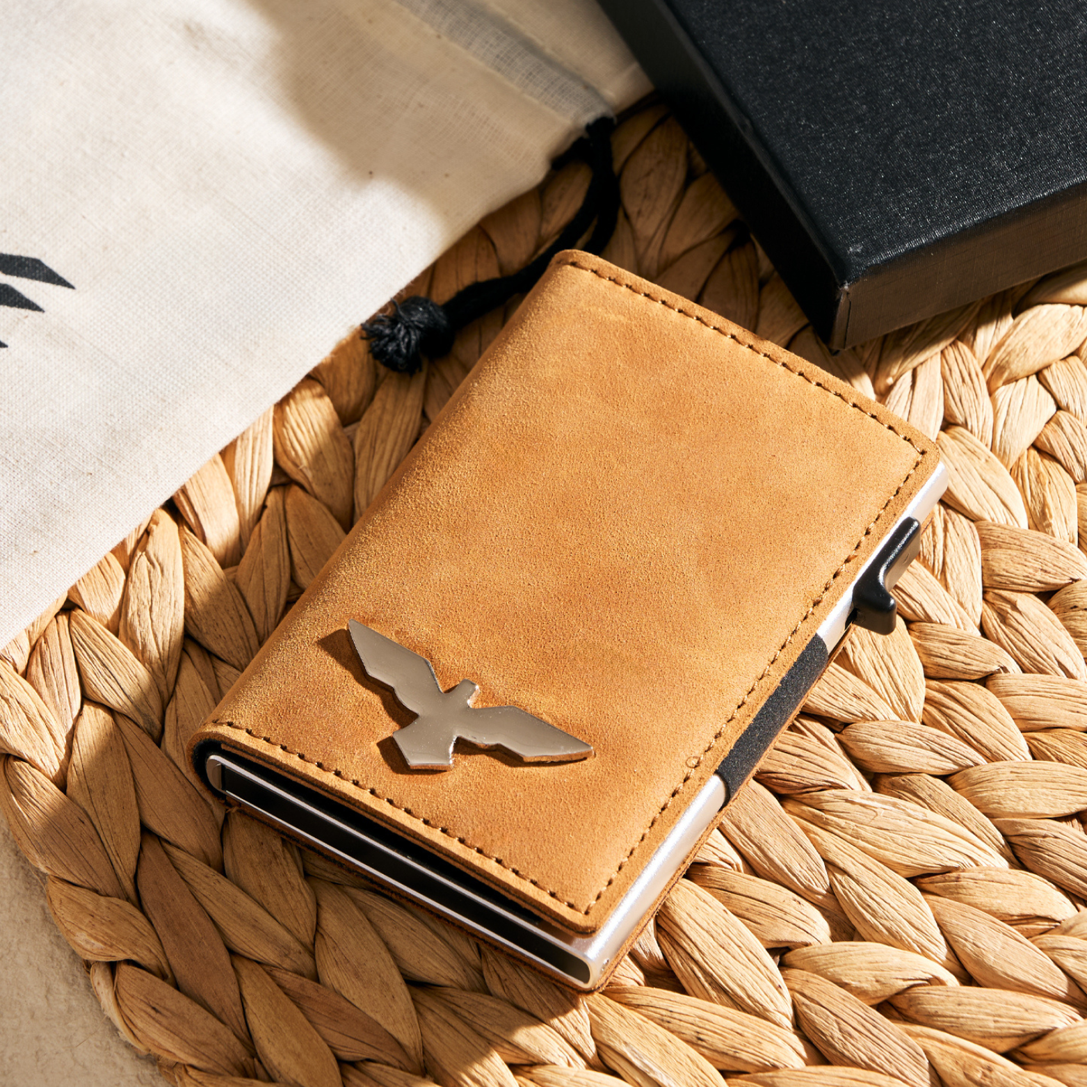 Porte-cartes escamotable minimaliste en cuir
